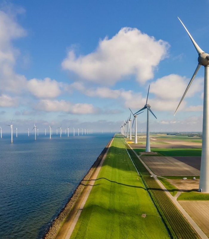 Windmill turbines at sea generate green energy in the Netherlands
